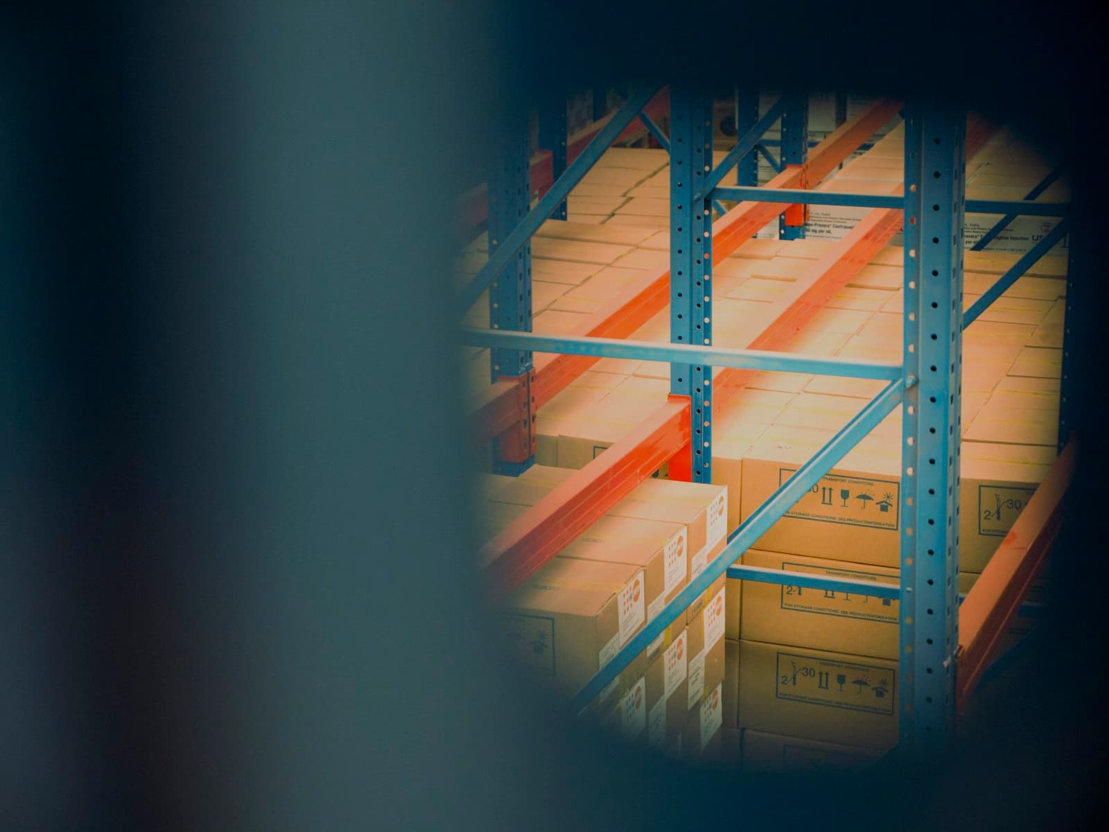 Boxes stored on warehouse racking
